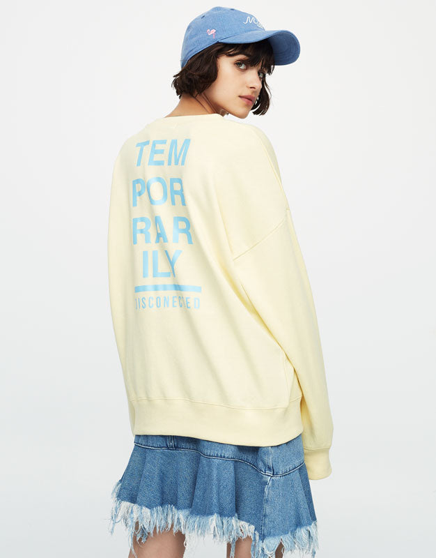 Sweatshirt with slogan on back